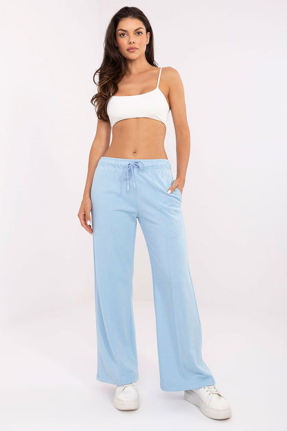 Luxury high-waisted tracksuit trousers by Relevance, featuring a soft cotton-polyester blend and stylish side pockets, perfect for casual wear.