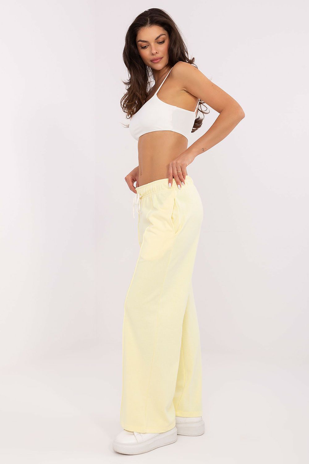 Relaxed fit of Relevance high-waisted luxury trousers, perfectly tailored for everyday elegance with functional side pockets.