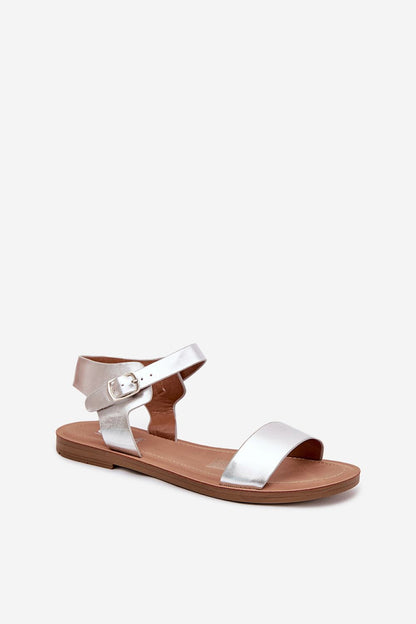 Elegant black eco leather sandals for women with adjustable buckle, designed by Step in Style, featuring a comfortable flat heel.