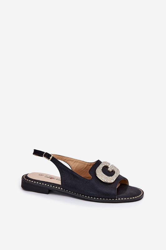 Elegant flat heel women's sandals made of eco leather by Step in Style, featuring a beautiful decorative element and adjustable strap for perfect fit.