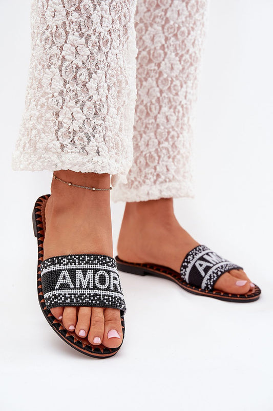 Luxury women's flat-heeled sandals featuring an exquisite Amore strap, designed by Step in Style, crafted from eco-leather for superior comfort.
