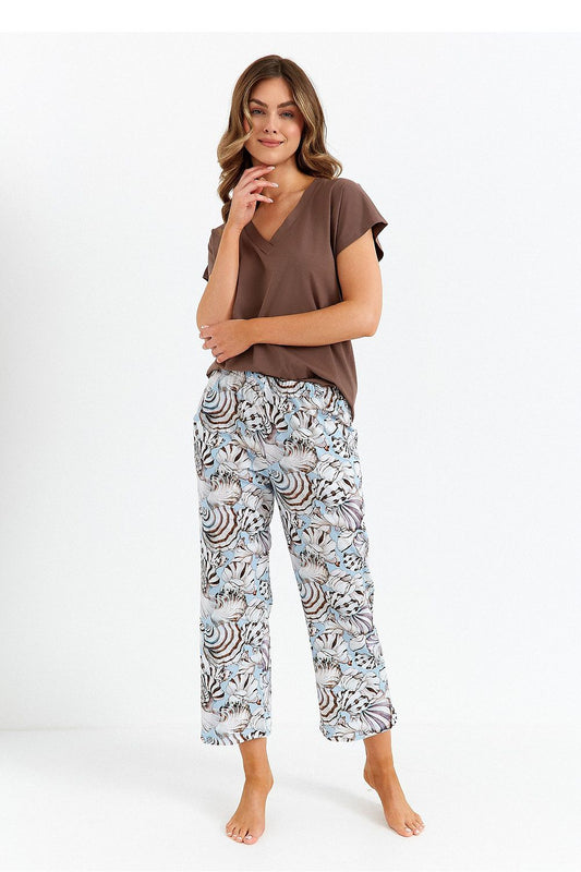 Elegant luxury women's pyjama set by Cana featuring a V-neck top and stylish 7/8 printed pants, designed for ultimate comfort and sophistication.