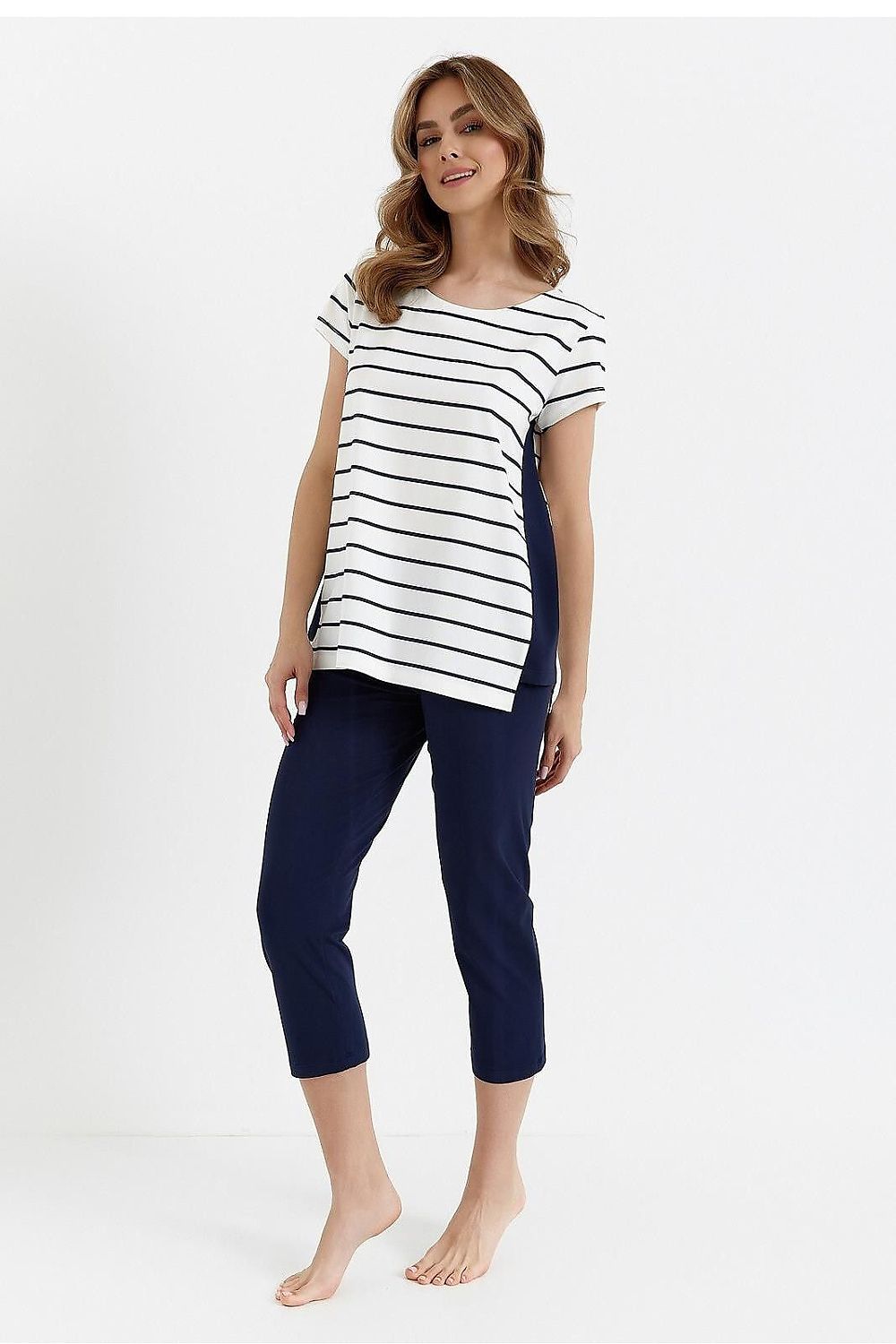 Luxurious women's cotton pyjama set by Cana, featuring a short sleeve blouse and 3/4 length pants, ideal for stylish comfort at home.