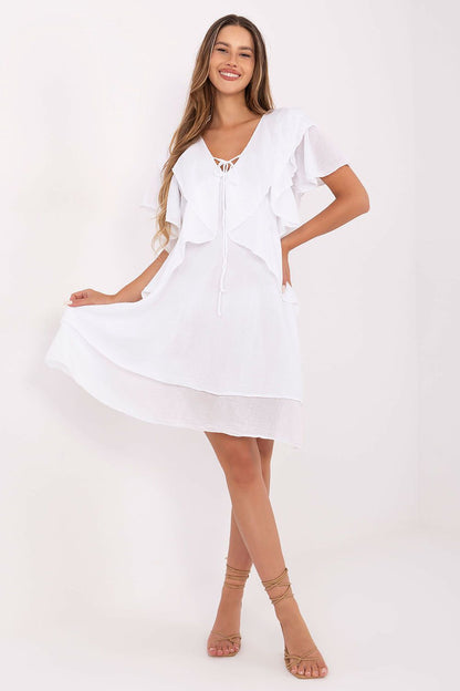 Elegant boho style knee-length cotton dress designed by Italy Moda, featuring ruffled sleeves, perfect for summer occasions.
