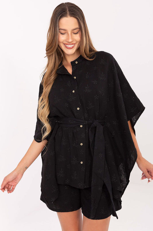 Luxurious Lakerta Elegant Cotton Shirt and Shorts Set in breathable muslin fabric, showcasing delicate embroidery, perfect for summer styling. Size EU S/M | US S/M, featuring a stylish stand-up collar, 3/4 sleeves, and comfortable high-waisted shorts with pockets.