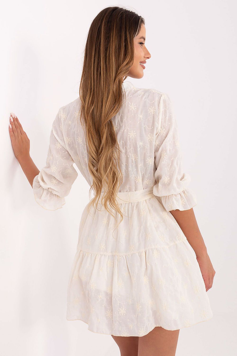 The graceful silhouette of Lakerta's Boho Chic Flared Mini Dress with waist tie belt, ideal for a luxurious casual look.