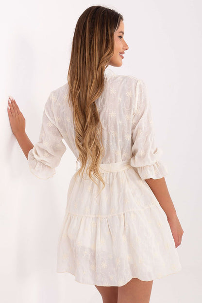 The graceful silhouette of Lakerta's Boho Chic Flared Mini Dress with waist tie belt, ideal for a luxurious casual look.