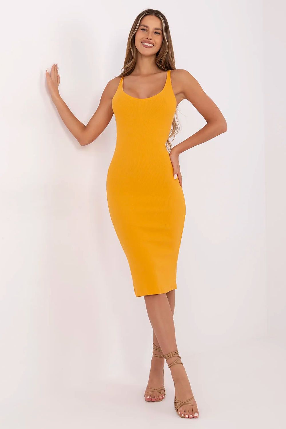 Close-up of the smooth striped fabric of Rue Paris' elegant midi dress, showcasing its luxurious texture and fitted silhouette.