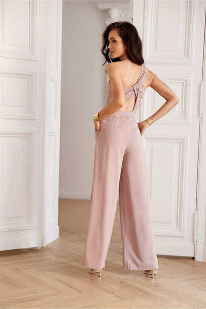 Fashionable model wearing the Isotta one-shoulder jumpsuit by Roco Fashion, epitomising sophistication and contemporary style at an elegant event.