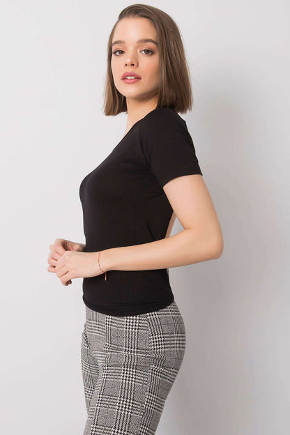 Detail of the sleek fabric and airy cut of the Rue Paris open back blouse, ideal for both casual and work outfits.