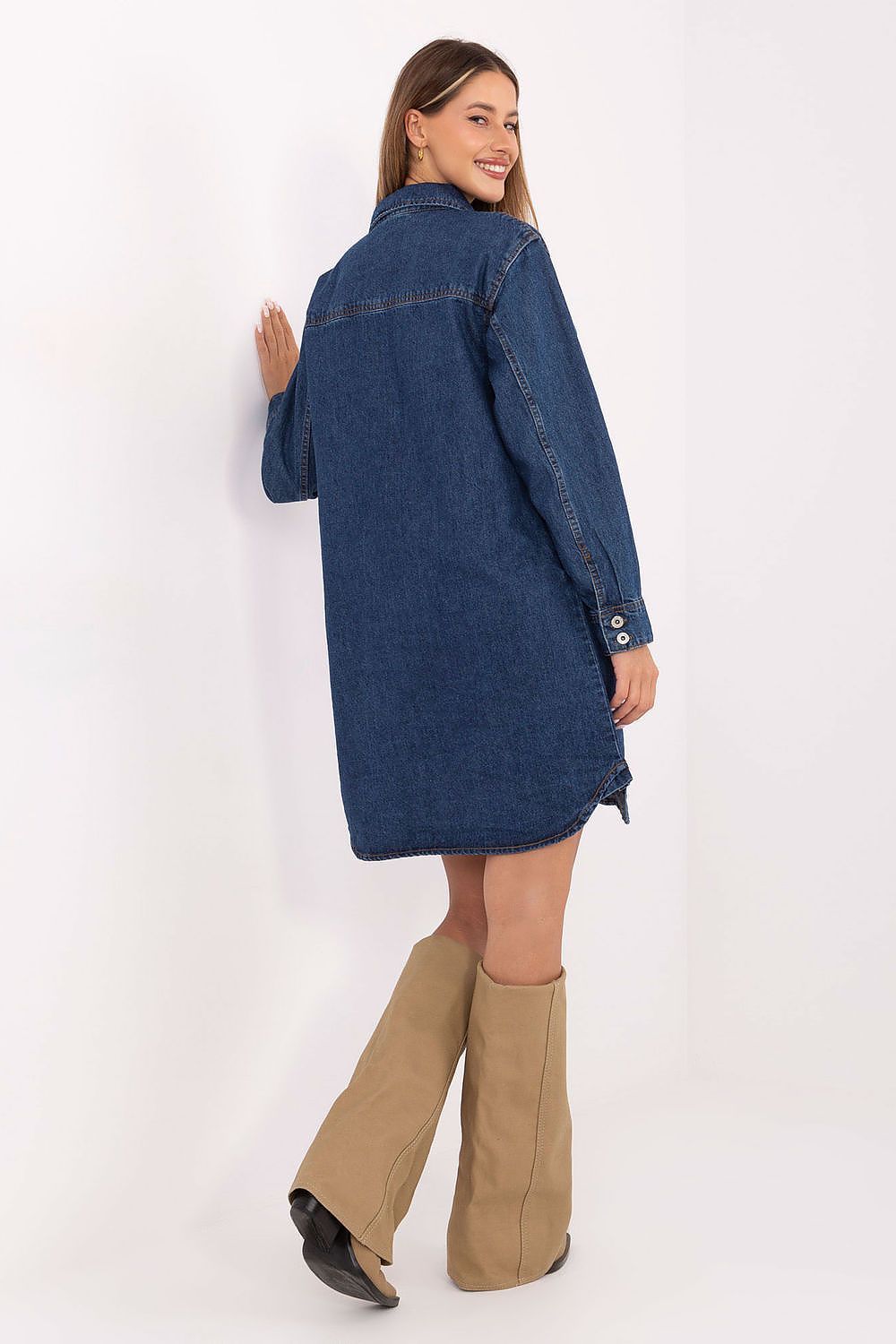 Stylish side view of the Timeless Cotton Denim Daydress by Sublevel showcasing practical pockets and elegant silhouette.
