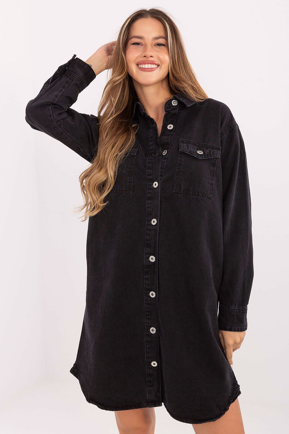 Model wearing the Timeless Cotton Denim Daydress by Sublevel paired with ankle boots, illustrating versatility and chic style.