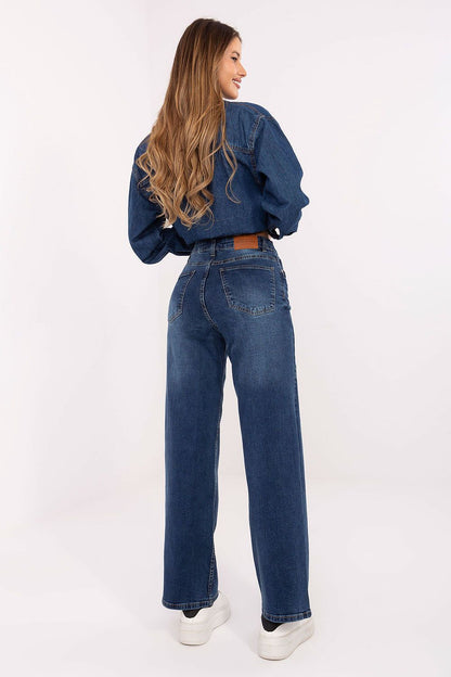 Elegant denim styling featuring Sublevel's high-waisted wide leg jeans, designed for a flattering fit in a versatile casual look.