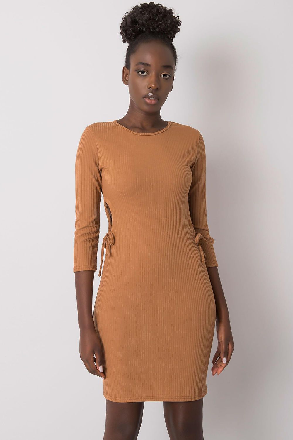 Close-up of Lakerta Casual Pencil Dress details showcasing decorative lacing and side cuts on a stylish ribbed fabric.