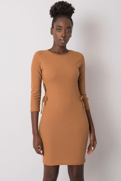 Close-up of Lakerta Casual Pencil Dress details showcasing decorative lacing and side cuts on a stylish ribbed fabric.