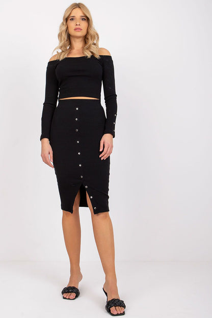 Stylish Rue Paris midi skirt with decorative buttons, designed to flatter the silhouette effortlessly.