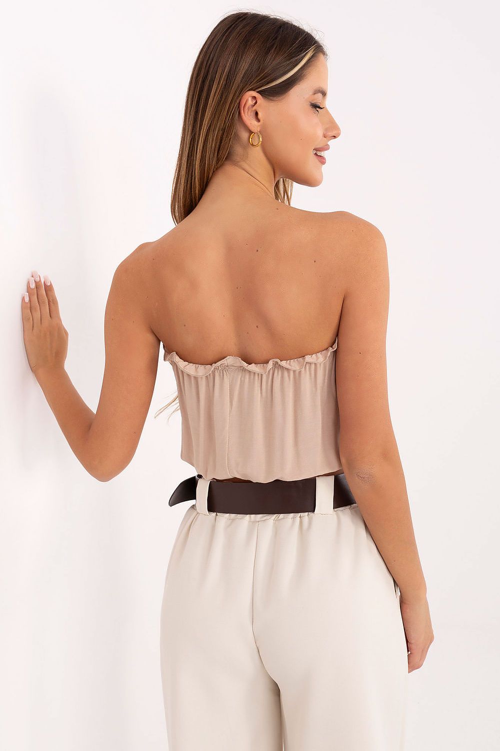 Close-up of Lakerta's elegant sleeveless crop top in soft viscose, highlighting the smooth texture and thoughtful minimalist details.