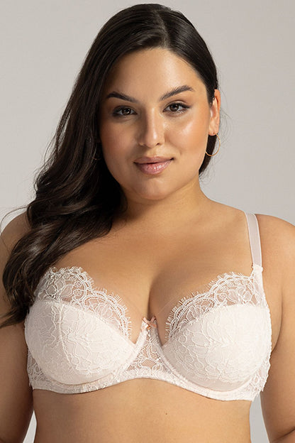 Elegant semi-soft wedding bra for larger busts by Ava, featuring deep comfortable cups, romantic lace embellishments, and a charming bow - perfect for brides.