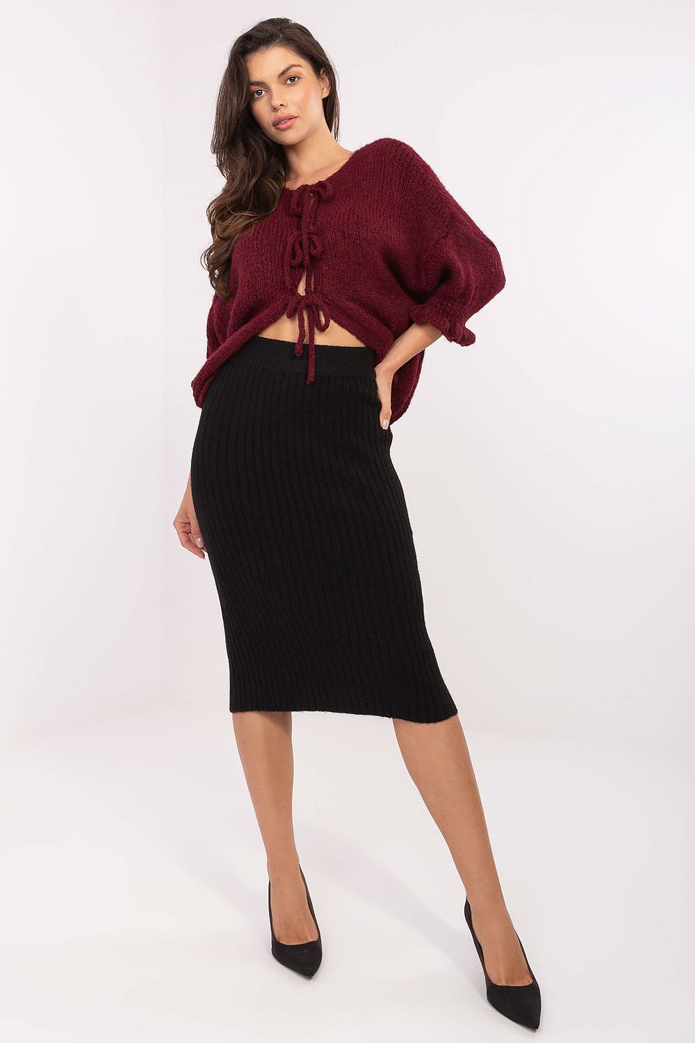 Luxurious ribbed knit midi skirt by Sublevel, showcasing soft elastic fabric and classic silhouette in an elegant design.