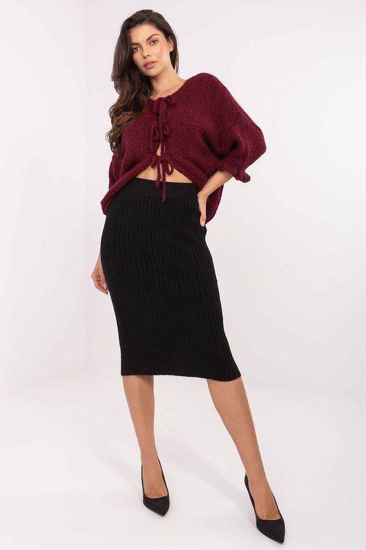 Luxurious ribbed knit midi skirt by Sublevel, showcasing soft elastic fabric and classic silhouette in an elegant design.