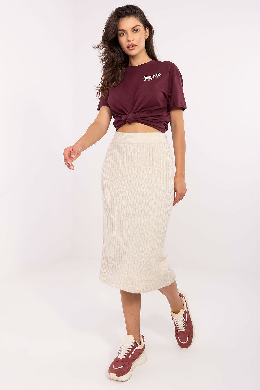 Stylish Sublevel ribbed midi skirt, ideal for minimalist outfits, highlighting effortless elegance and comfort.