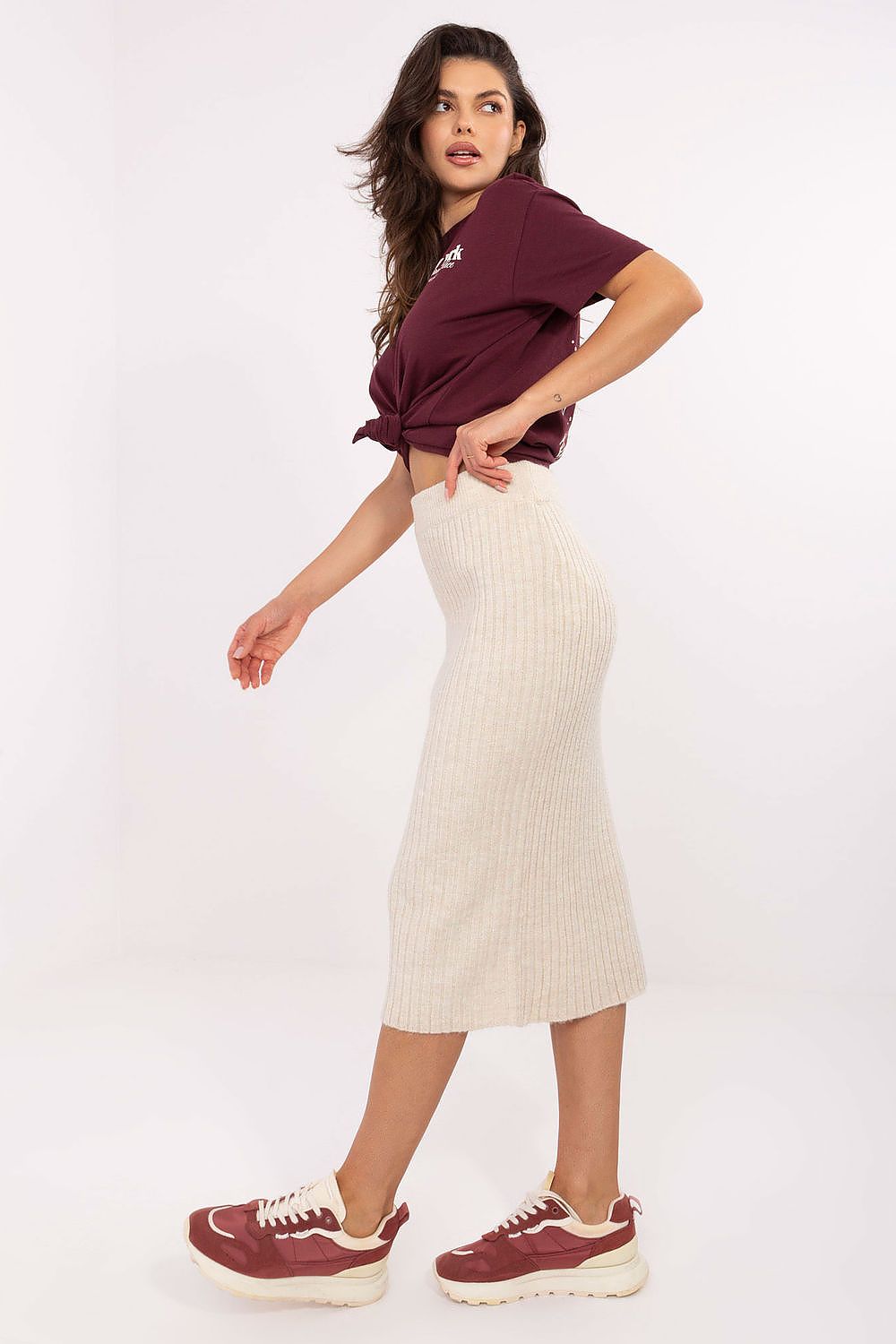 Chic ribbed knit midi skirt by Sublevel, crafted from a luxurious blend of materials for an effortlessly stylish look.