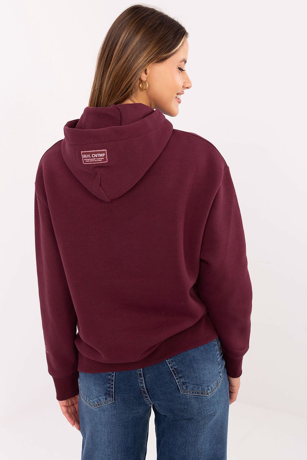 Sublevel luxury women's sweatshirt in a variety of sizes, highlighting its cozy inner lining and fashionable embroidery.