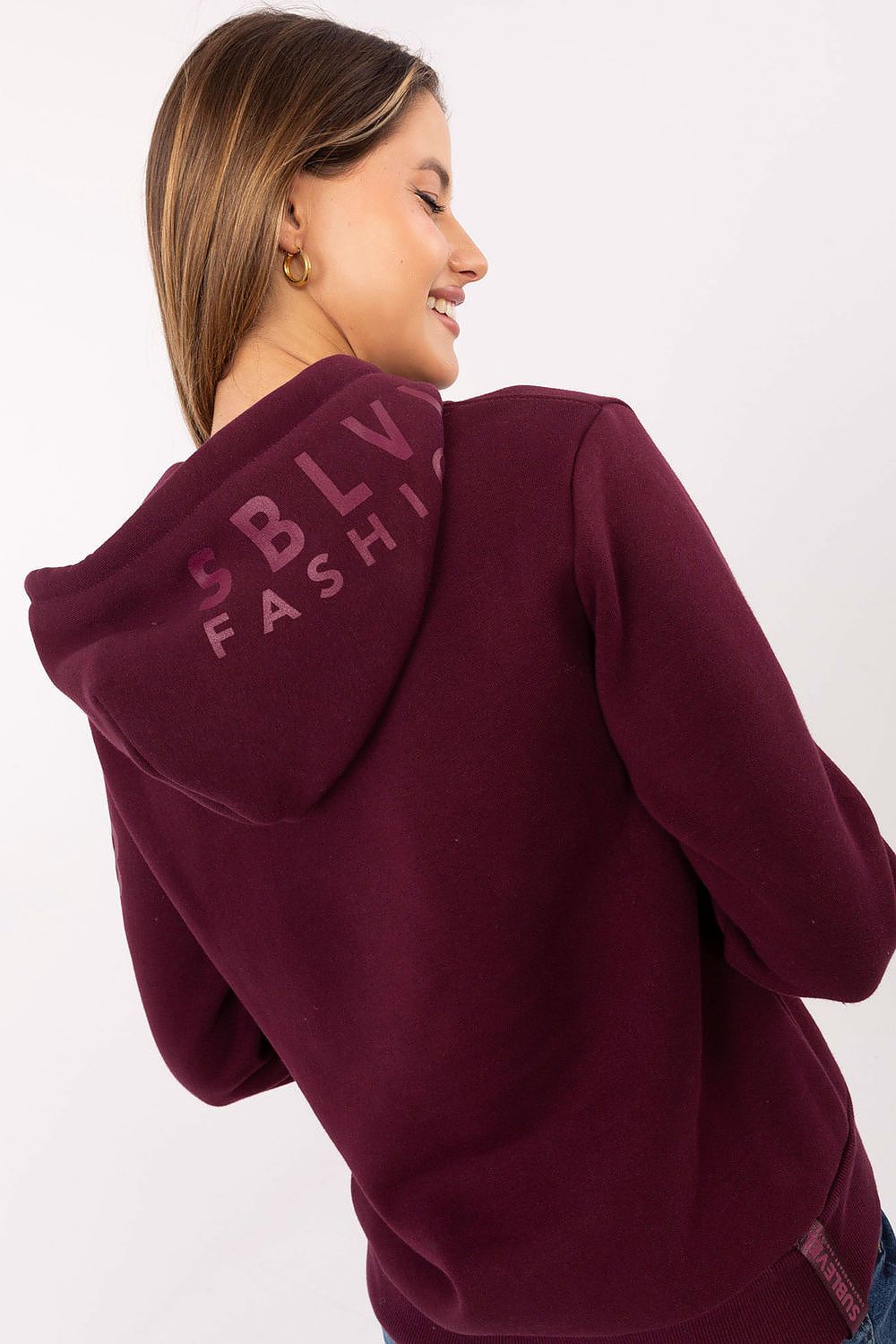 Chic black women's sweatshirt by Sublevel featuring a hood and subtle prints on sleeves, ideal for a fashionable yet relaxed look in all sizes.