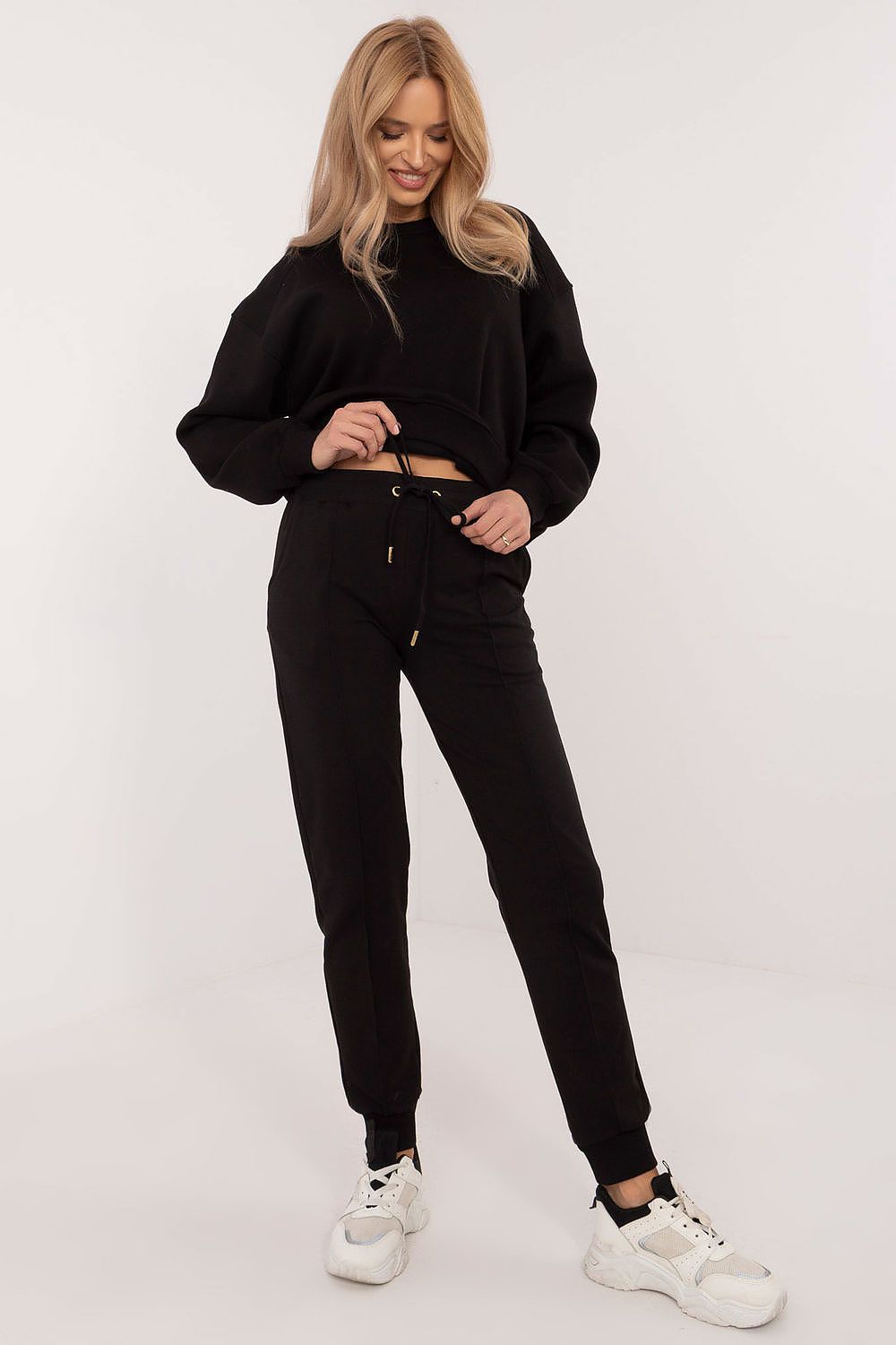 Luxury Cotton-Spandex tracksuit trousers for men and women by Factory Price, featuring elegant side pockets and a modern silhouette.