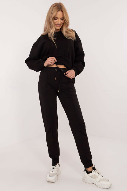 Luxury Cotton-Spandex tracksuit trousers for men and women by Factory Price, featuring elegant side pockets and a modern silhouette.