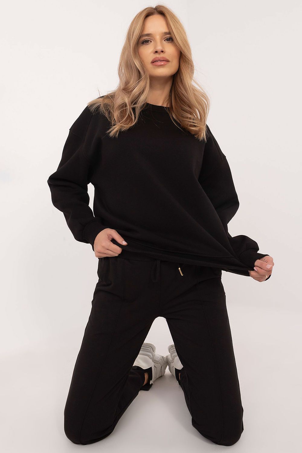 Stylish Cotton-Spandex men's and women's tracksuit trousers by Factory Price, designed for comfort and chic casual wear.