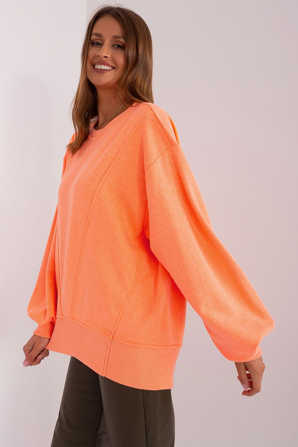 Chic Ex Moda Women's oversized blouse, designed for versatile styling with jeans or leggings, featuring a modern round neckline.