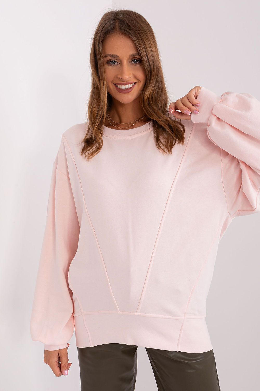 Stylish Ex Moda Women's sweatshirt with unique stitching detail, exemplifying luxury in everyday fashion with an oversized fit.
