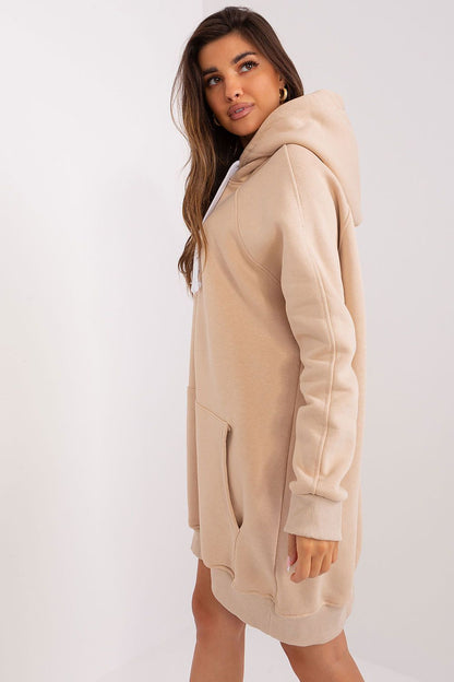 Side view of Ex Moda Women's Long Hooded Sweatshirt, offering a stylish look suitable for everyday activities and leisure.