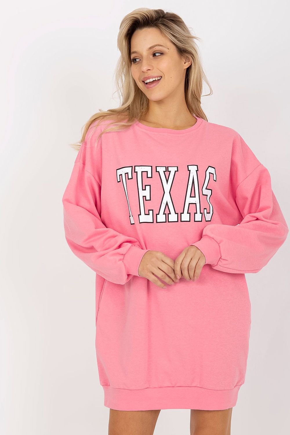 Sophisticated long casual sweatshirt for women by Ex Moda, showcasing a trendy design with a modern inscription and ribbed accents.