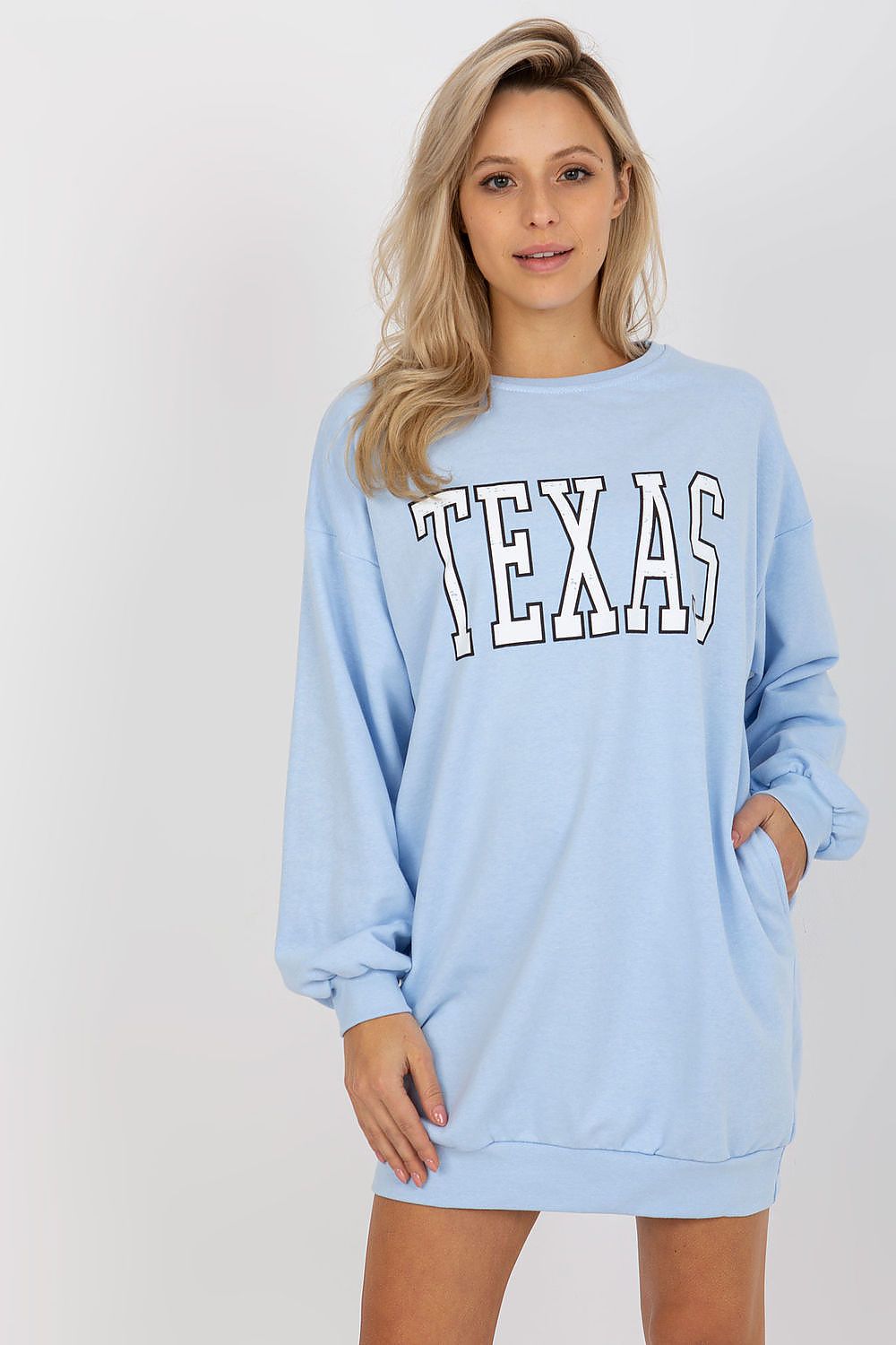Comfortable and fashionable women's casual sweatshirt by Ex Moda, highlighting its classic round neckline and modern inscription.