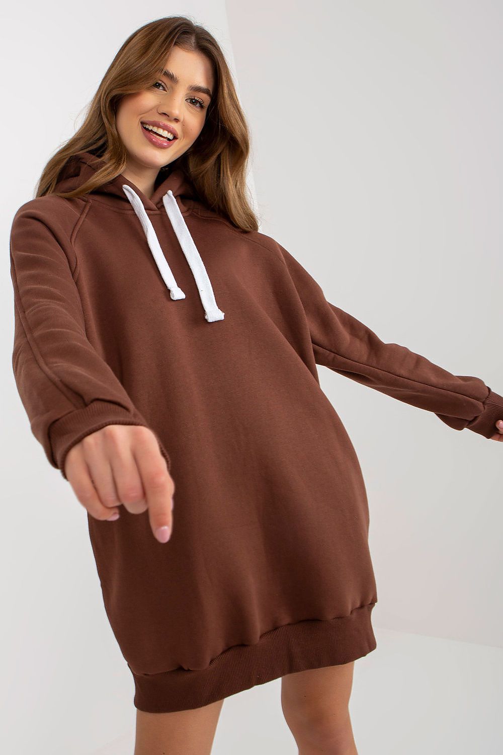 Ex Moda Women's Long Cotton-Polyester Sweatshirt styled with leggings, demonstrating versatility and comfort in a modern casual outfit.