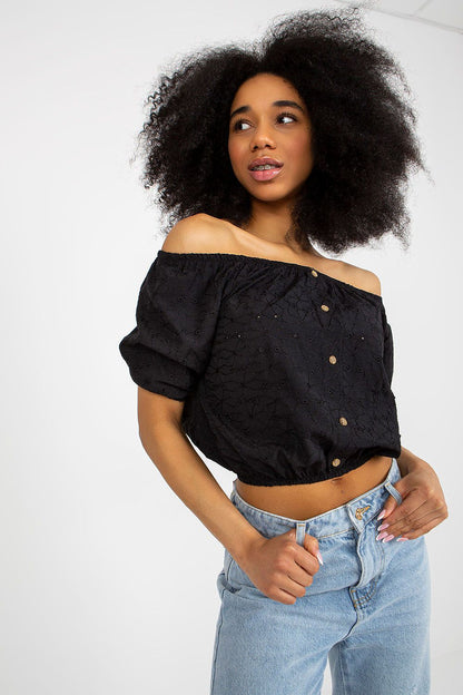 Elegant short-sleeve Lakerta blouse with off-the-shoulder design and intricate lace details, perfect for feminine bohemian looks.