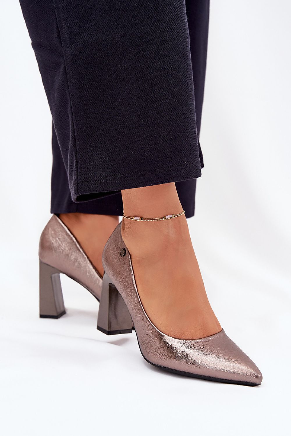 Stylishly arranged women's pumps from Step in Style, featuring an 8.5 cm column heel and perfect for elegant occasions.
