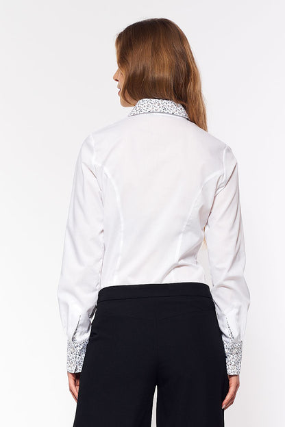 The luxurious Nife long sleeve cotton blend shirt displayed on a model, highlighting its elegant silhouette and stylish pattern details.