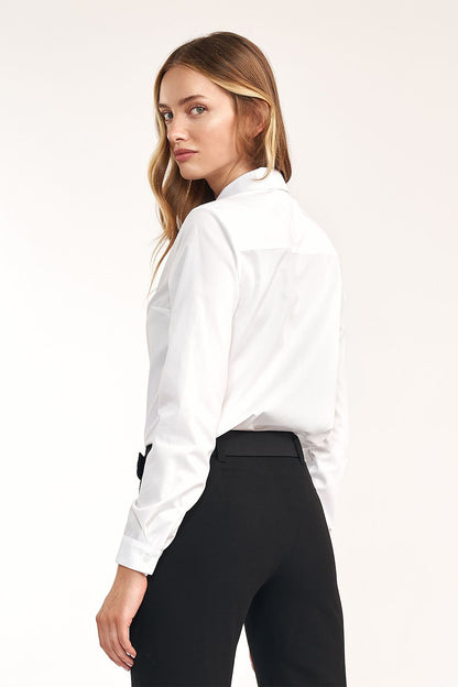 Close-up detail of Nife's exquisite white long sleeve shirt, highlighting the premium cotton blend and sophisticated design elements.