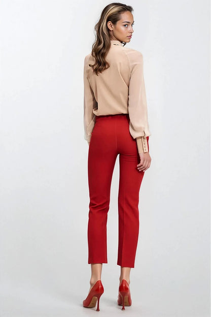 Elegant beige decorative scarf blouse by Nife, featuring a stylish neck tie and wide cuffed sleeves, perfect for a sophisticated wardrobe in EU sizes 36-44.