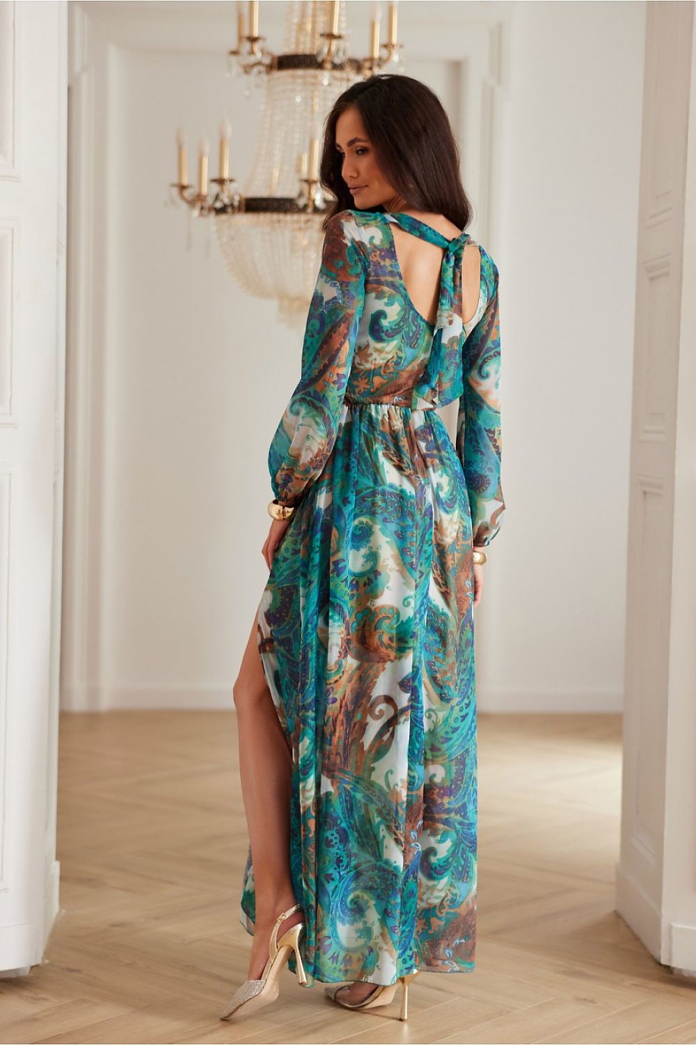 Model wearing the Alessia Maxi Chiffon Cocktail Dress by Roco Fashion in a stylish autumn-inspired colour, ideal for elegant events or gatherings.