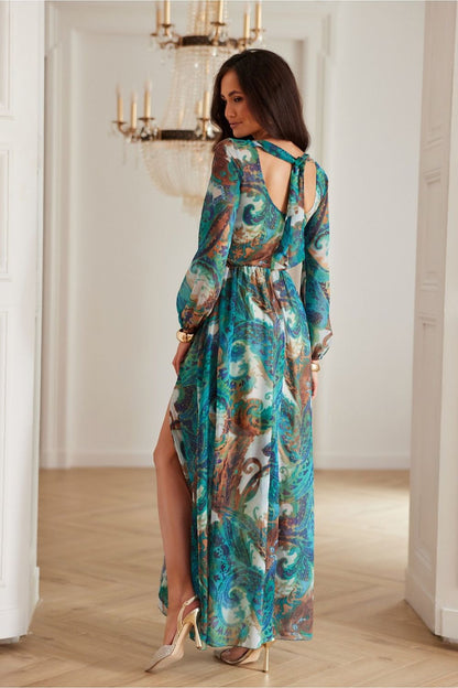 Model wearing the Alessia Maxi Chiffon Cocktail Dress by Roco Fashion in a stylish autumn-inspired colour, ideal for elegant events or gatherings.