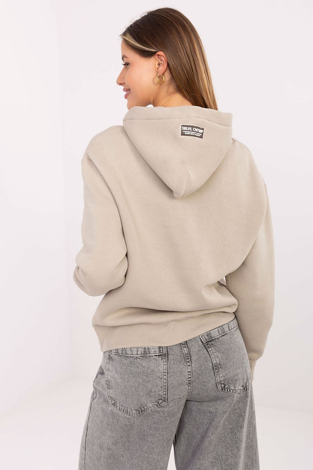 Luxurious women's casual sweatshirt from Sublevel, featuring a chic kangaroo pocket and comfortable fit, ideal for cooler days.