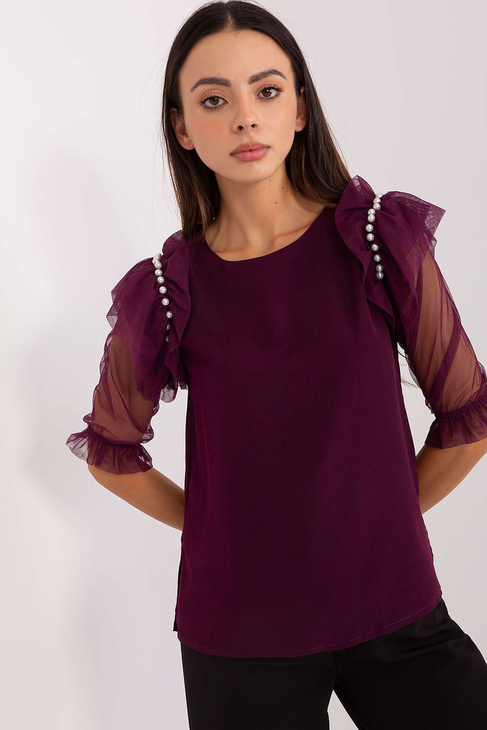 Close-up view of the decorative bead detailing on the shoulders of the Lakerta elegant blouse, highlighting its luxurious craftsmanship.