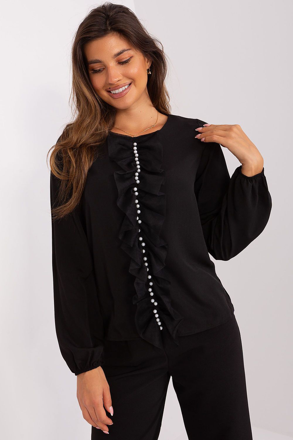 Elegant Lakerta blouse featuring vertical ruffles and beads, perfect for a sophisticated look.
