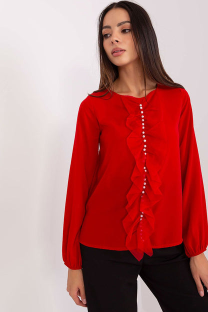 Luxurious Lakerta blouse with smooth fabric and classic round neckline, perfect for formal settings.