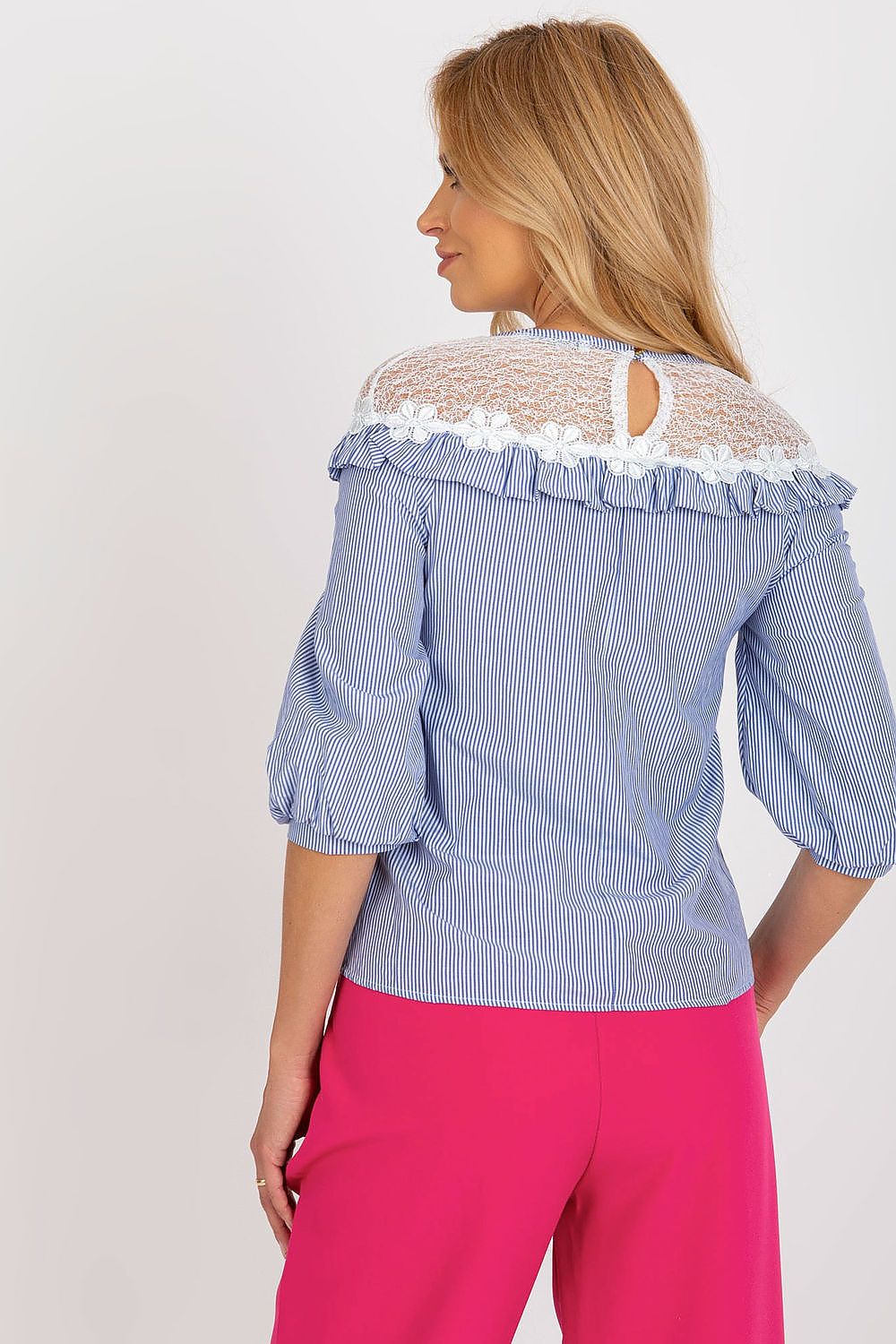Close-up of Lakerta's elegant cotton blouse showcasing its delicate lace trim and classic striped pattern, ideal for stylish work and formal wear.