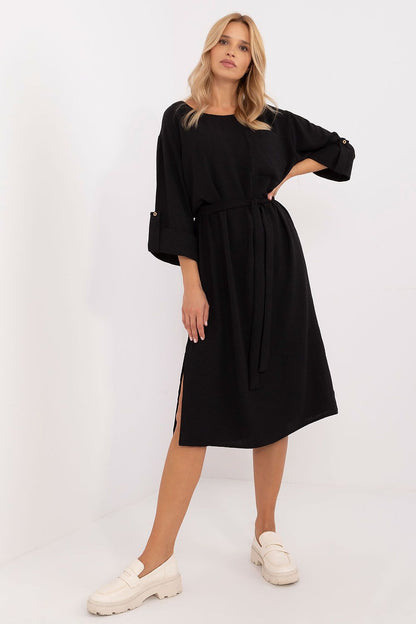 Versatile Lakerta midi dress showcasing side slits for ease of movement, perfect for everyday outings.